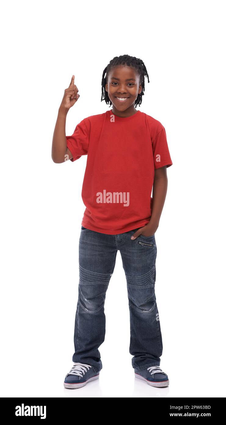 Things are looking up. A young ethnic boy on a white background Stock Photo