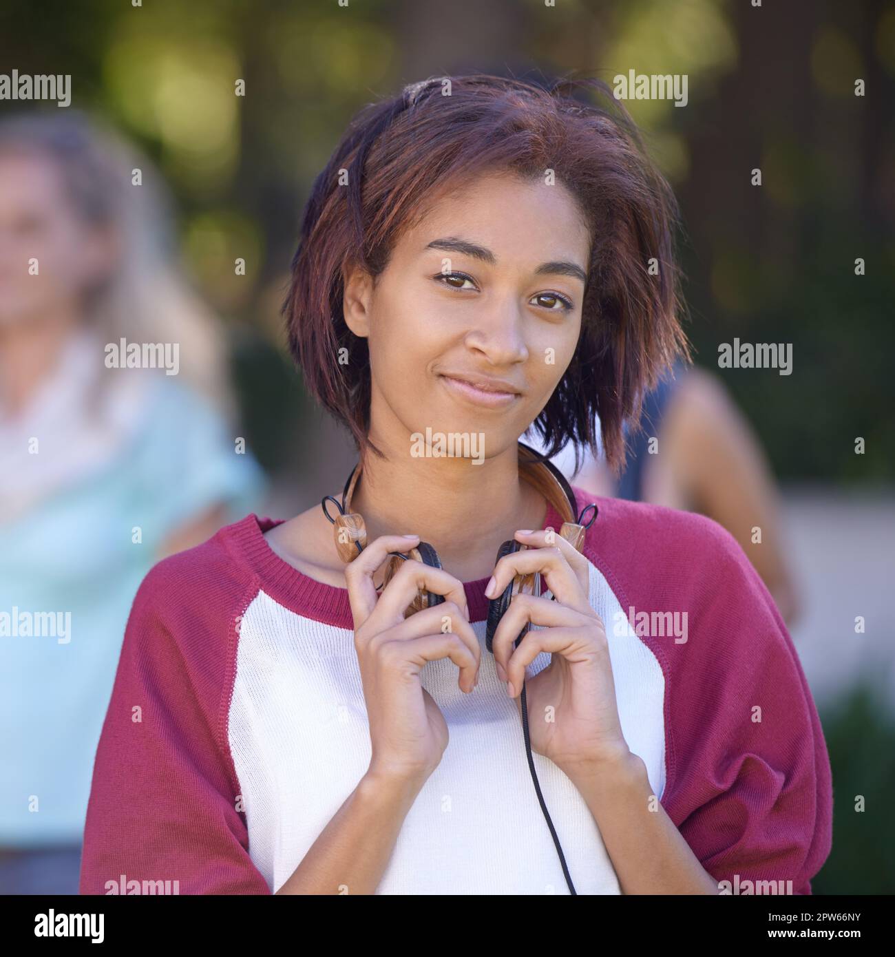 Starting the day with my favourite song. A young woman with headphones