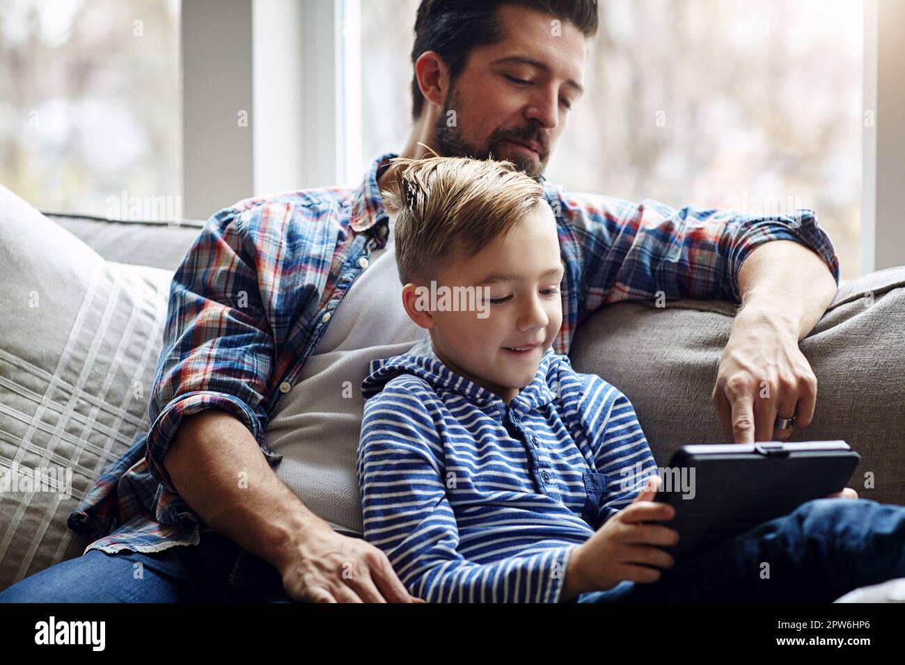 The world is becoming such a connected one for all. a little boy using ...