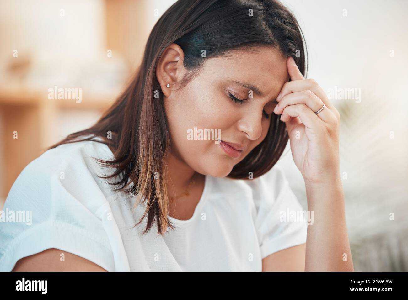 Woman, stress and headache about business fail while struggling with