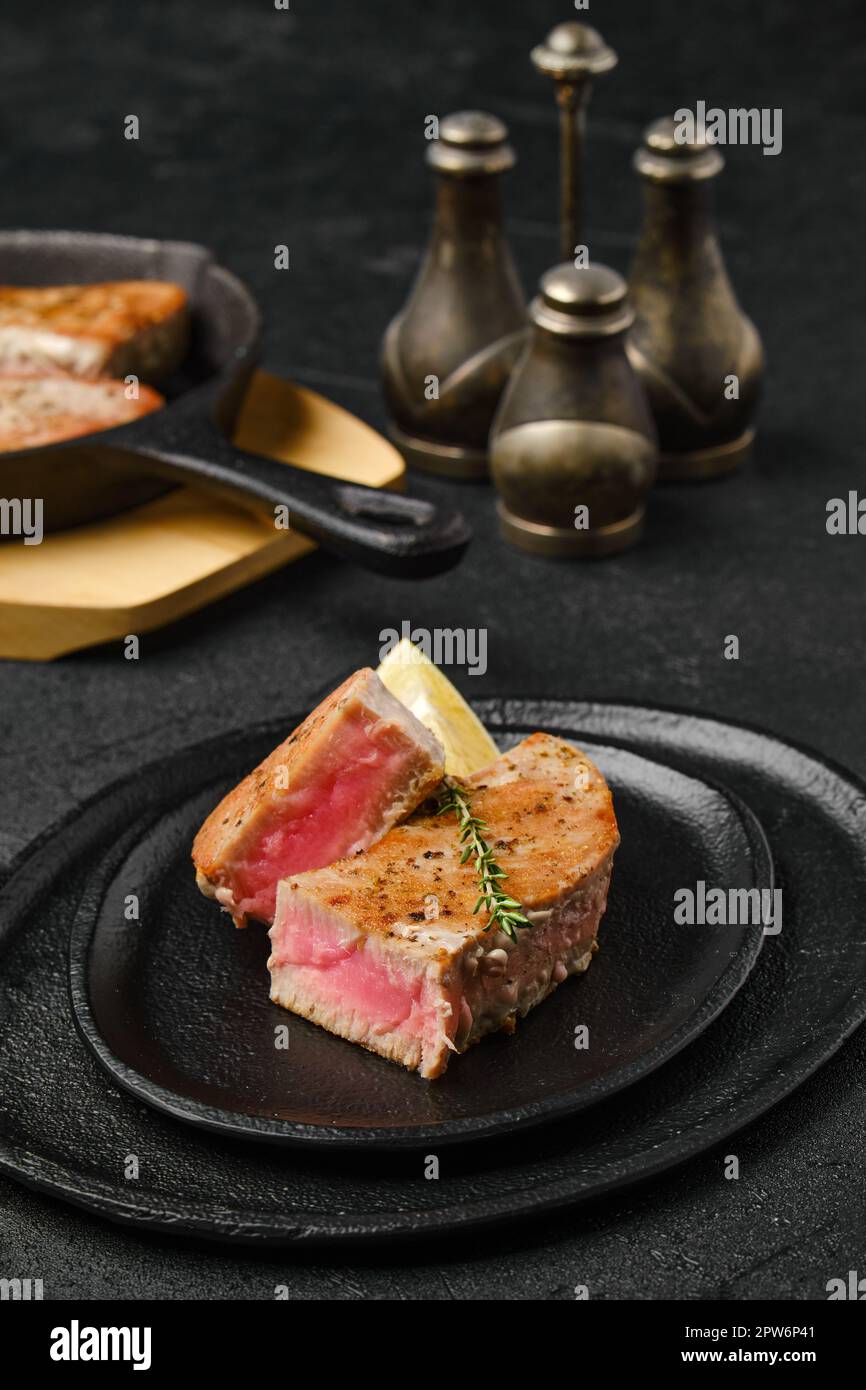 Roasted tuna steak medium rare on a plate Stock Photo Alamy