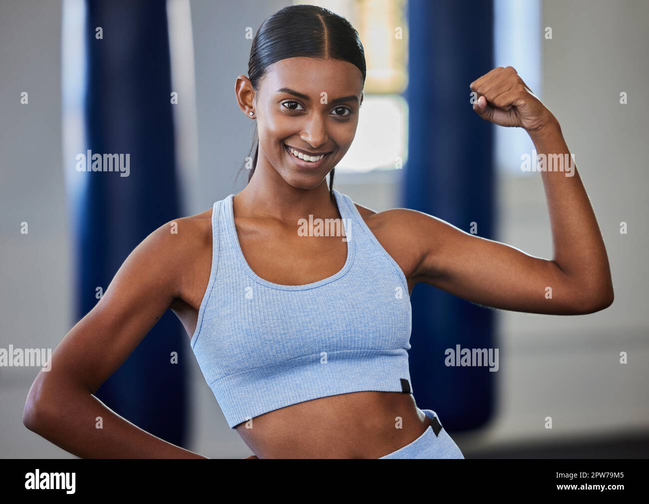Strong, fitness and muscle of woman or bodybuilder in portrait with power,  motivation and energy in gym studio for training or exercise. Body goals of  Stock Photo - Alamy