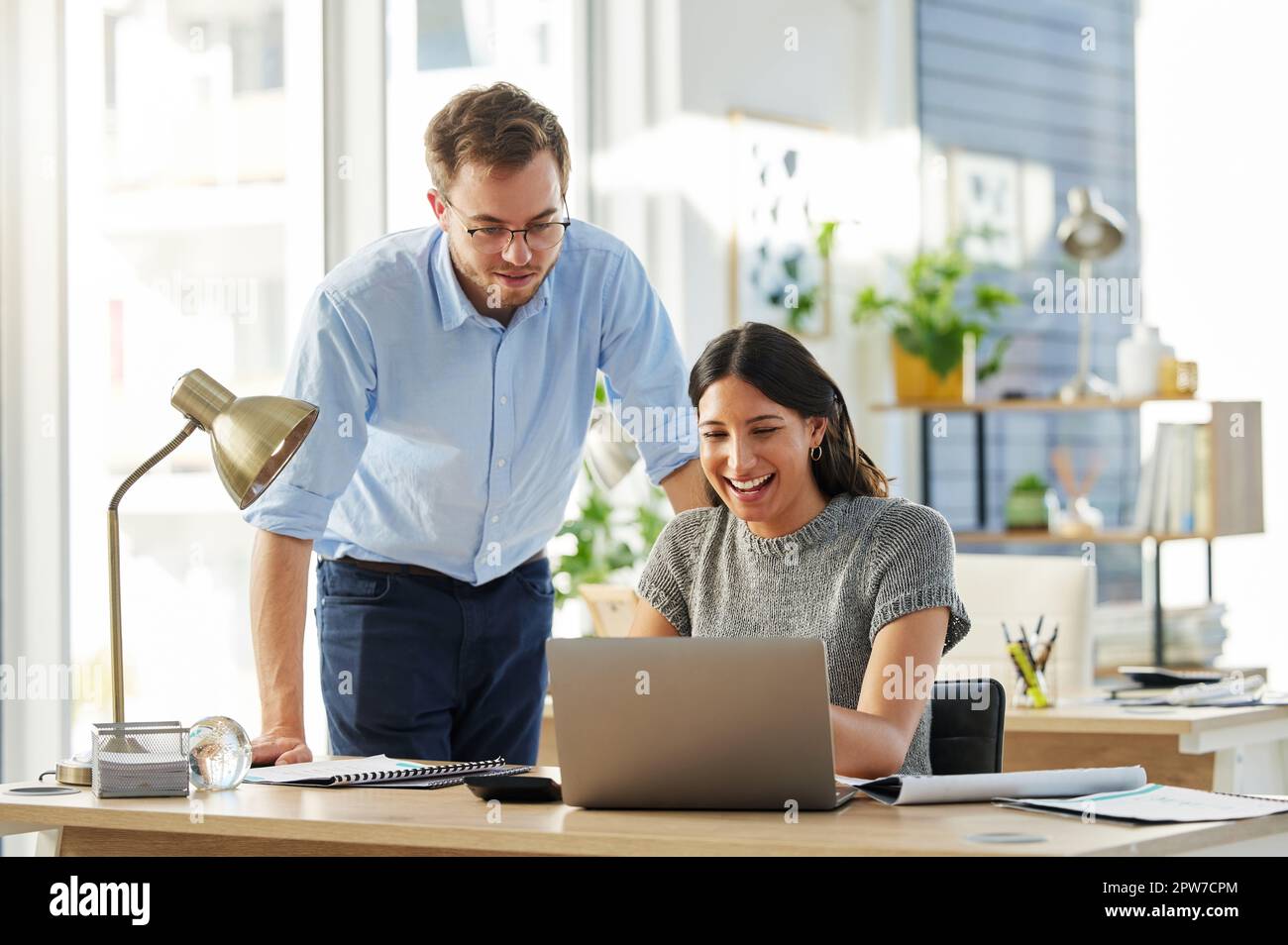 One man helping another man hi-res stock photography and images - Alamy