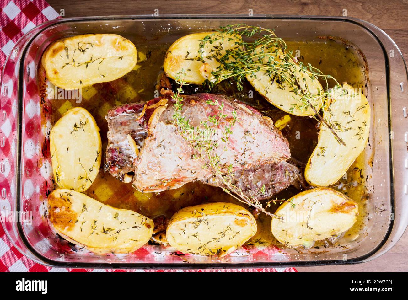 FLANK STEAK beef BBQ food. Meat roasted in a glass dish, with potatoes