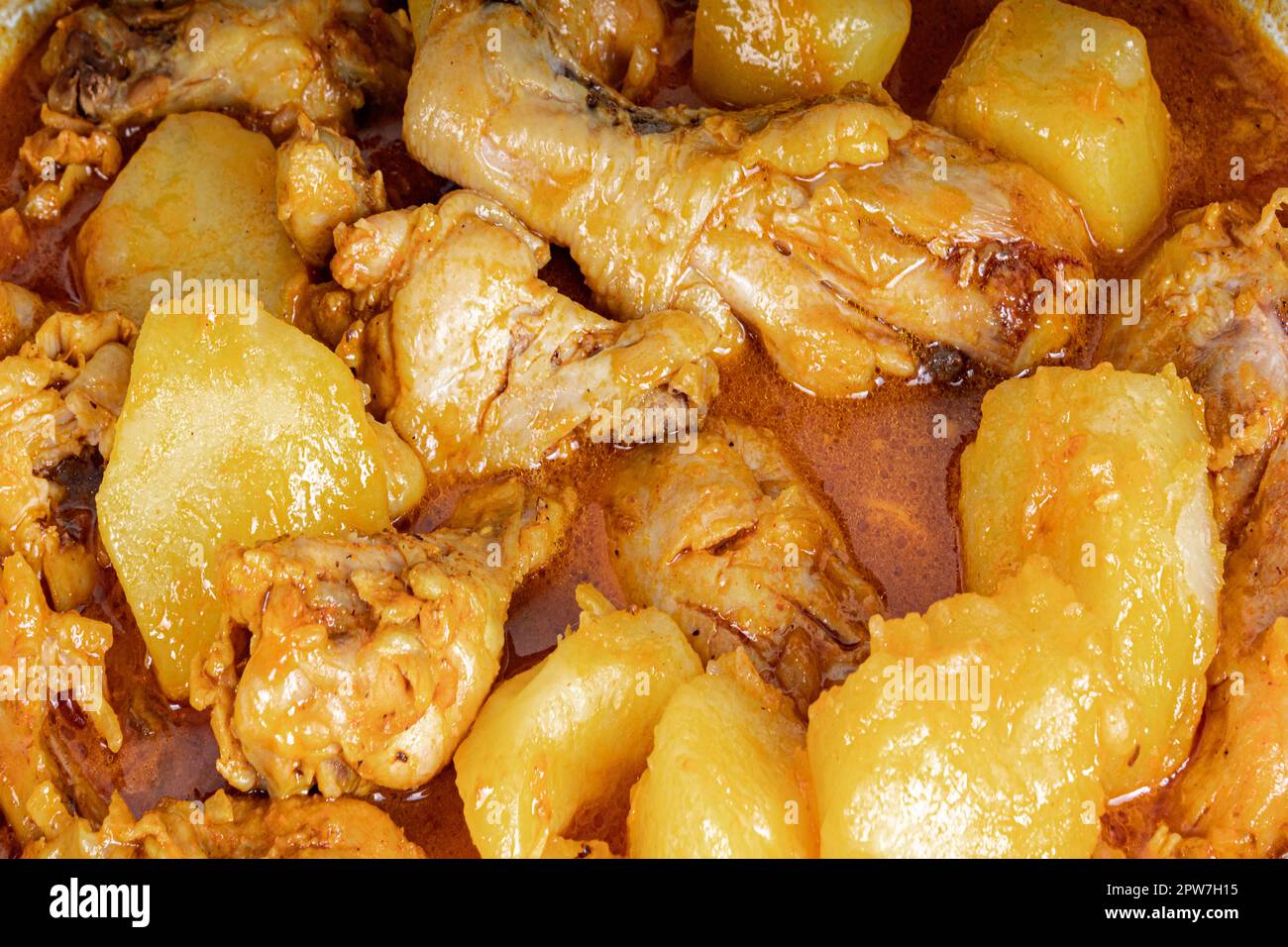 homemade chicken stew with tomatoes, onions, and potato Stock Photo Alamy