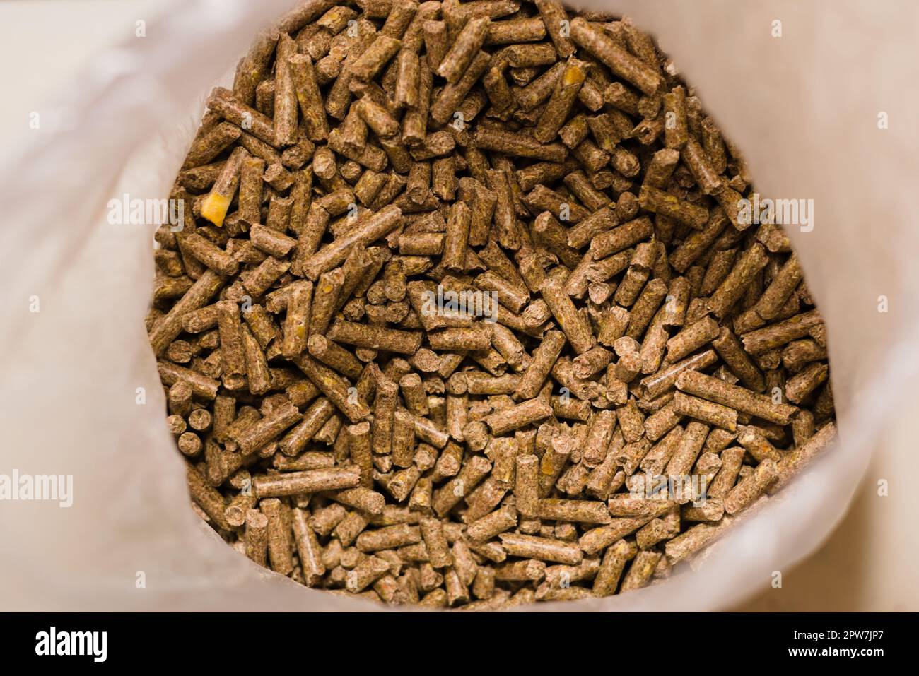 Picture of Guinea pig food in a bag, dry pellets. Close up Stock Photo - Alamy