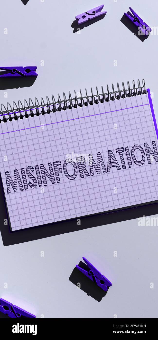Handwriting text Misinformation, Business overview false data, in particular, intended intentionally to deceive Stock Photo
