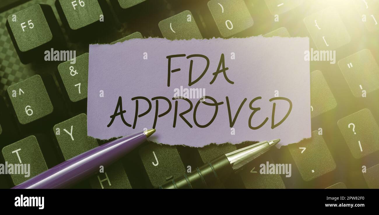 Sign displaying Fda Approved, Word for FDA agreed the product or formula is safe and or effective Stock Photo