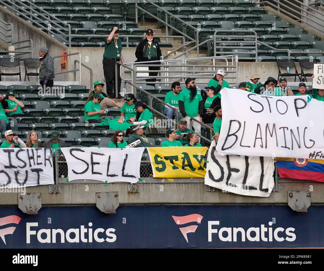 Oakland Athletics fans hang signs at RingCentral Coliseum to protest