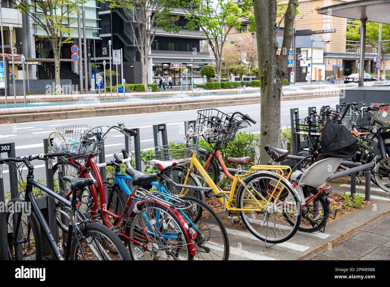 Bicycle parking rack beside an underground station in Kyoto,Japan,Asia Stock Photo