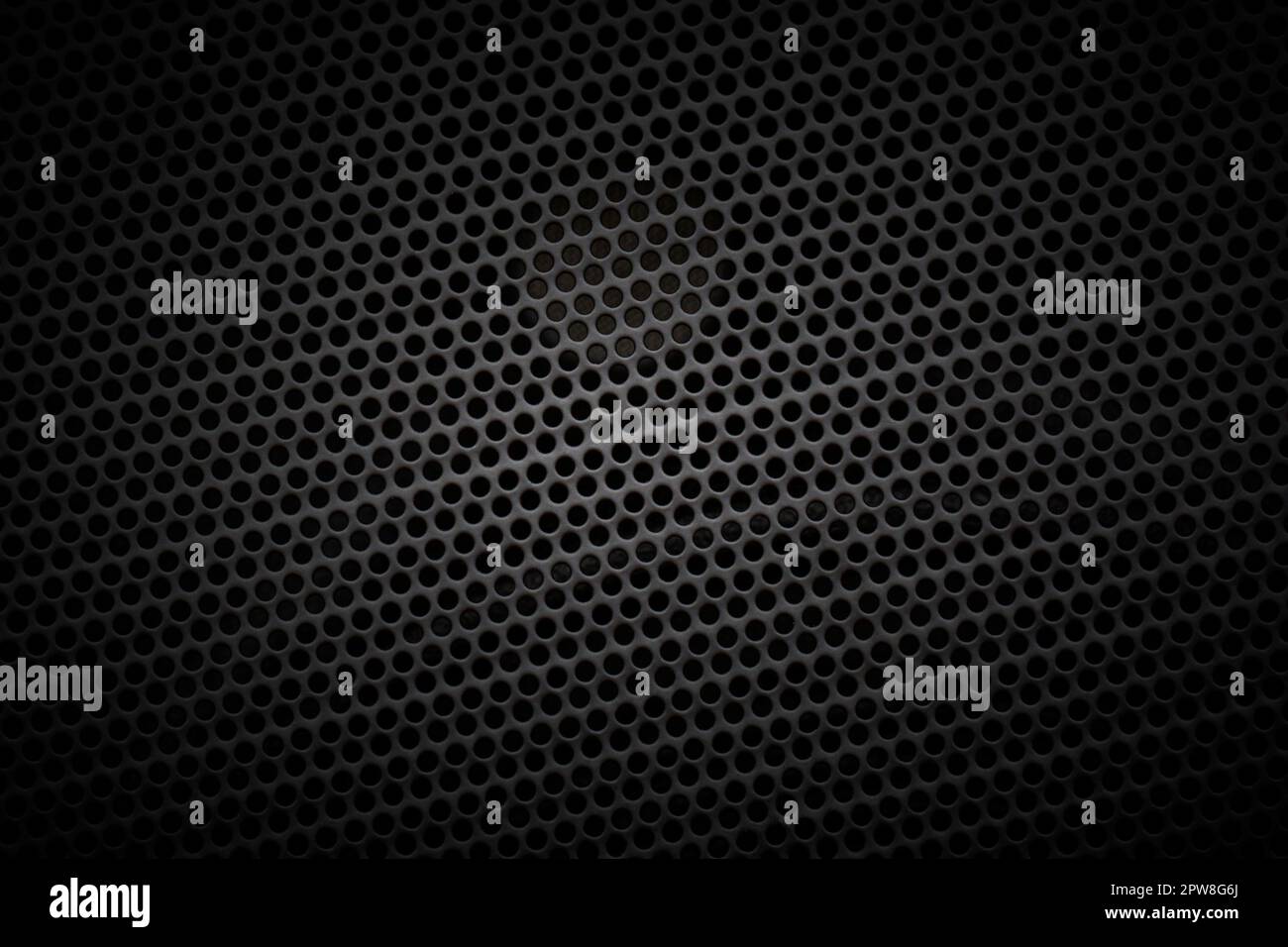 Black speaker grille background, close-up Stock Photo