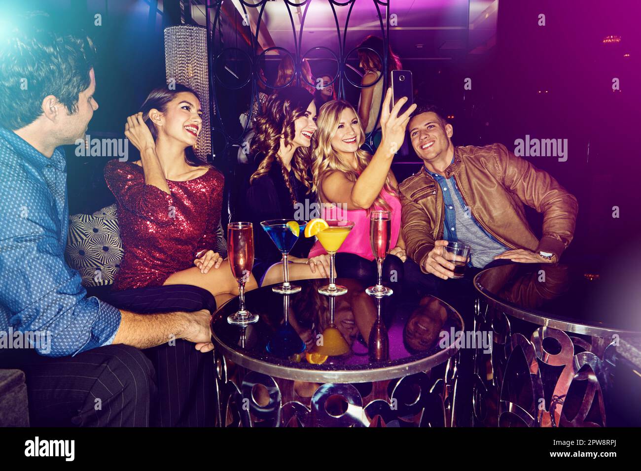 Smartphone Obsession At Night Club Party Stock Photo, Picture and Royalty  Free Image. Image 78105137.