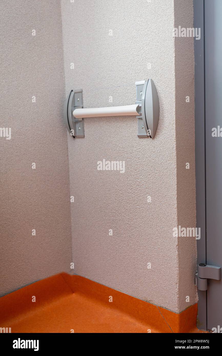 Plastic wall bumper mounted on the corridor without external bezel