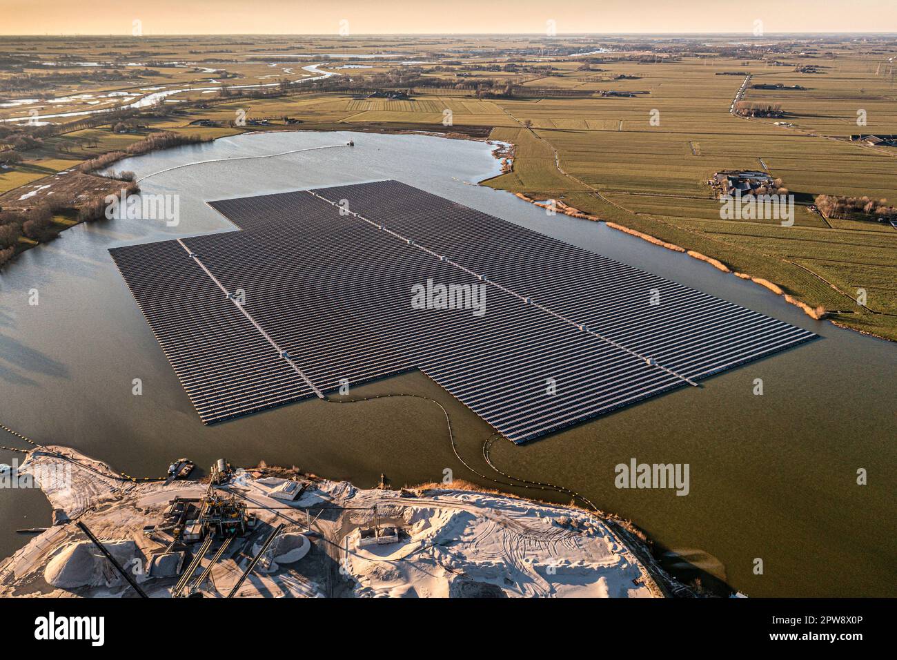 The Netherlands, Haerst near Zwolle, Floating solar panels in lake Bomhofsplas. Aerial. Stock Photo