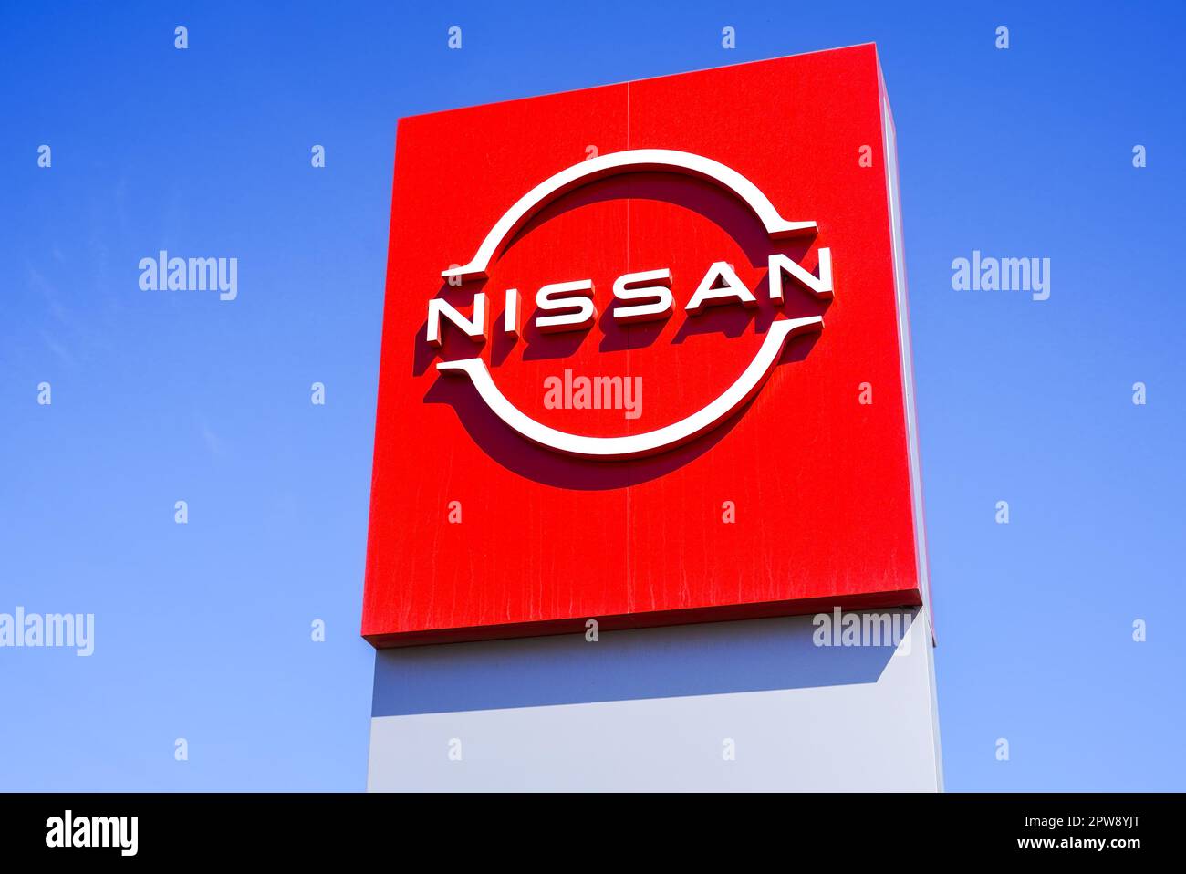Moscow, Russia - April 27, 2023: Stela with Nissan logo against a blue ...