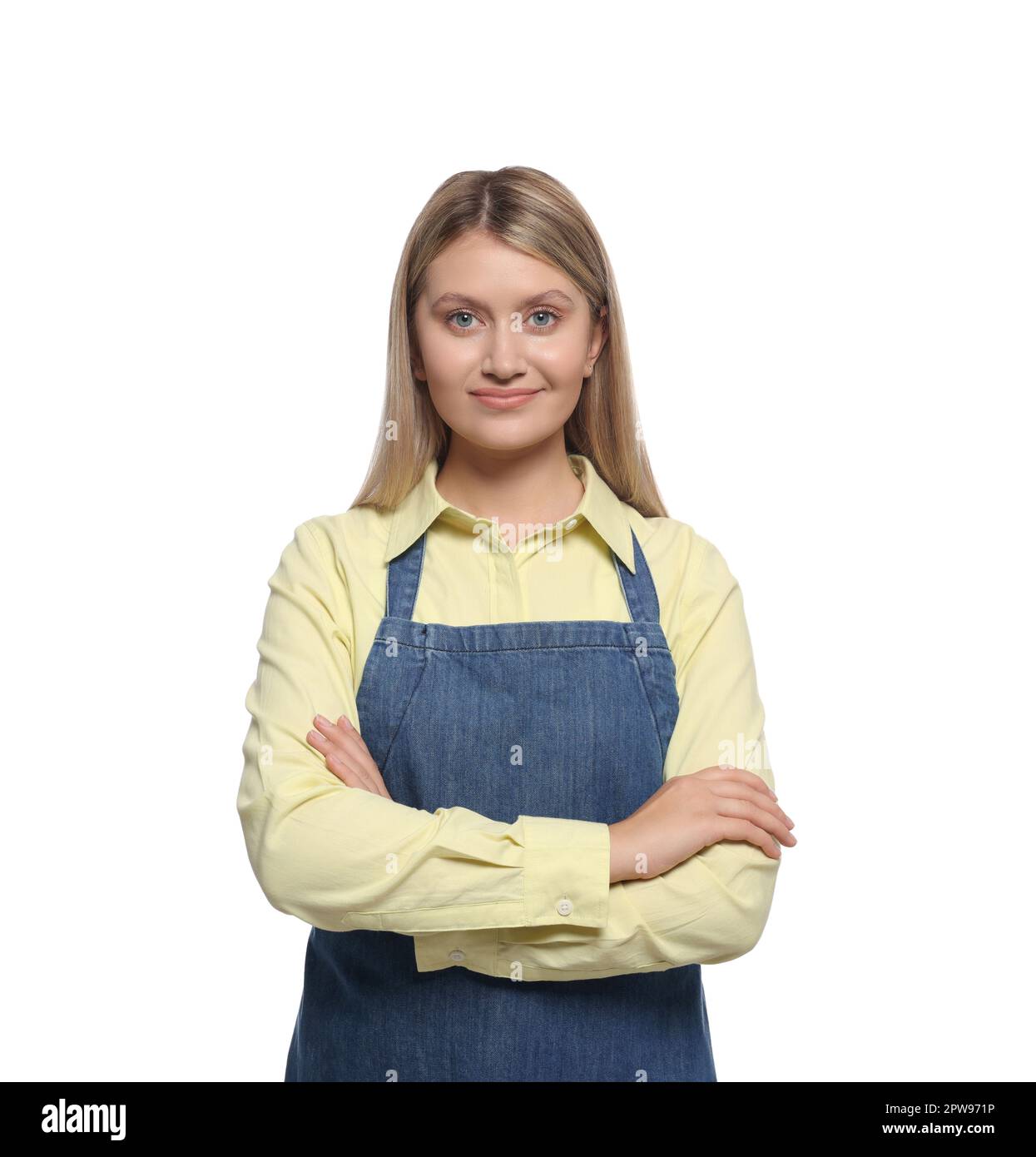 Beautiful young woman in denim apron on white background Stock Photo ...