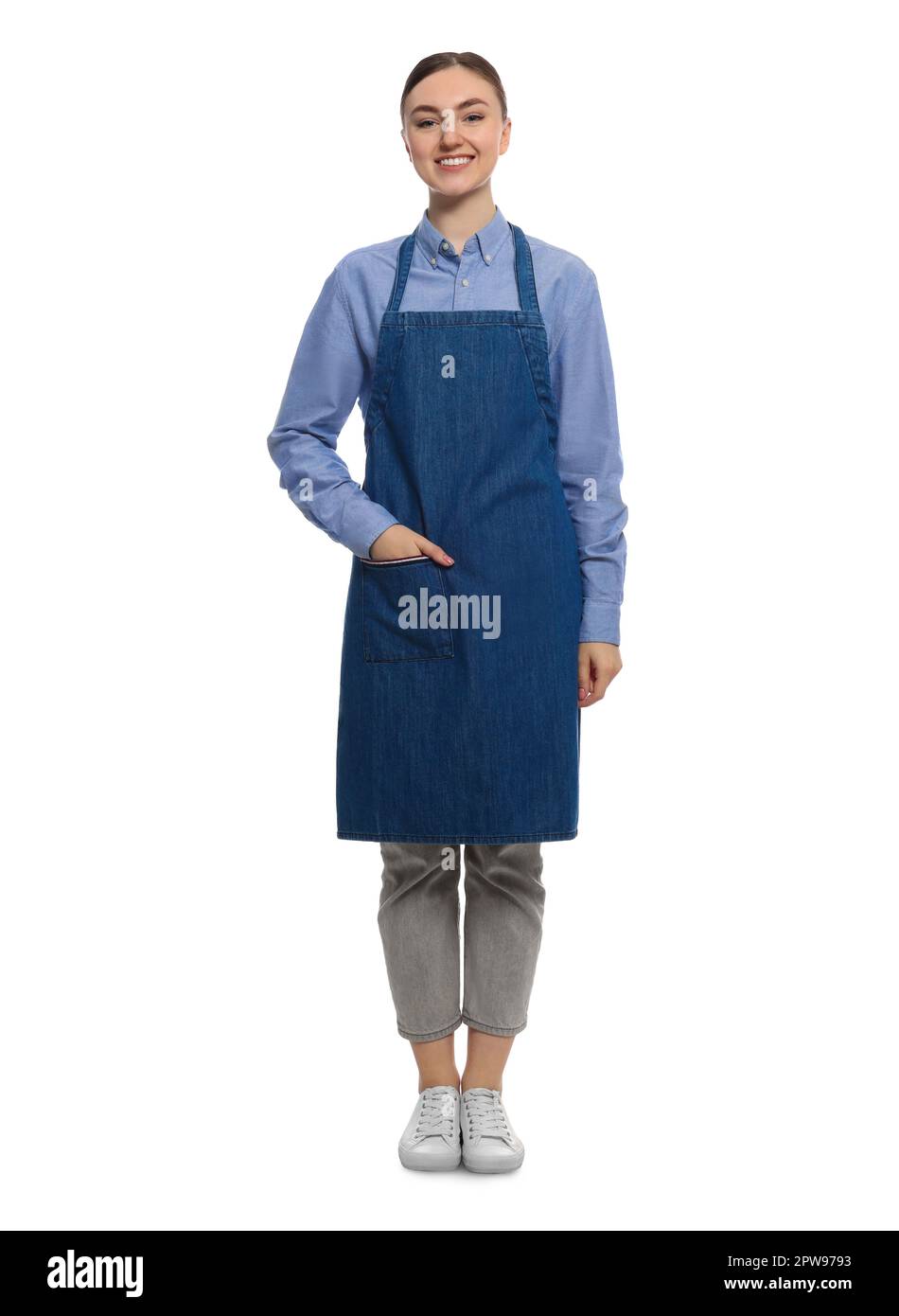 Beautiful young woman in clean denim apron on white background Stock ...