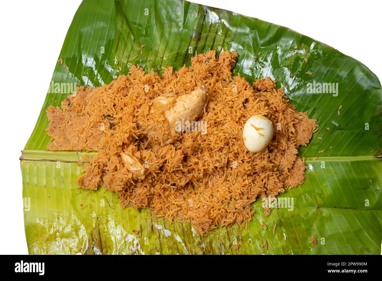 Hot chicken biryani in banana leaf on white background Stock Photo - Alamy