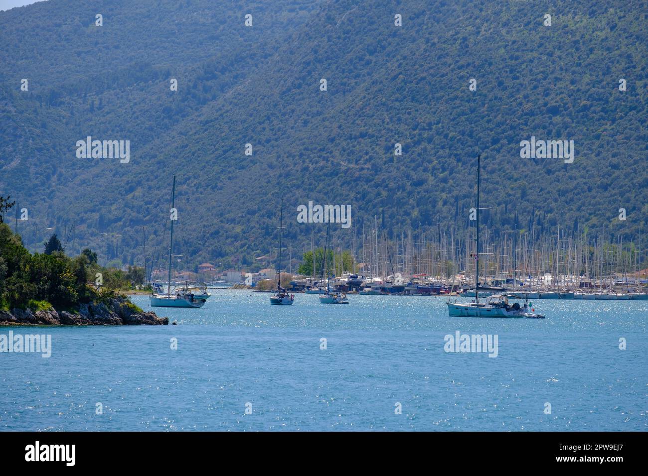Sailboats in Nydri harbour at Lefkada island in Greece Stock Photo