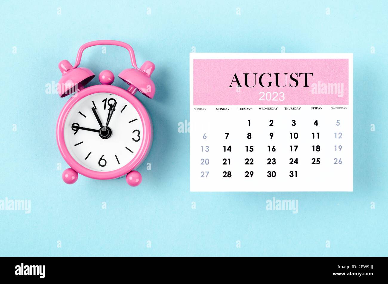 August 2023 Monthly calendar for 2023 year with pink color alarm clock