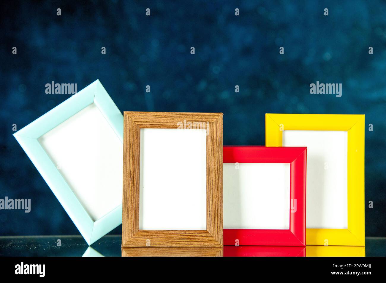 Different Photo Frame front view different picture frames with colored corners on dark-blue ...