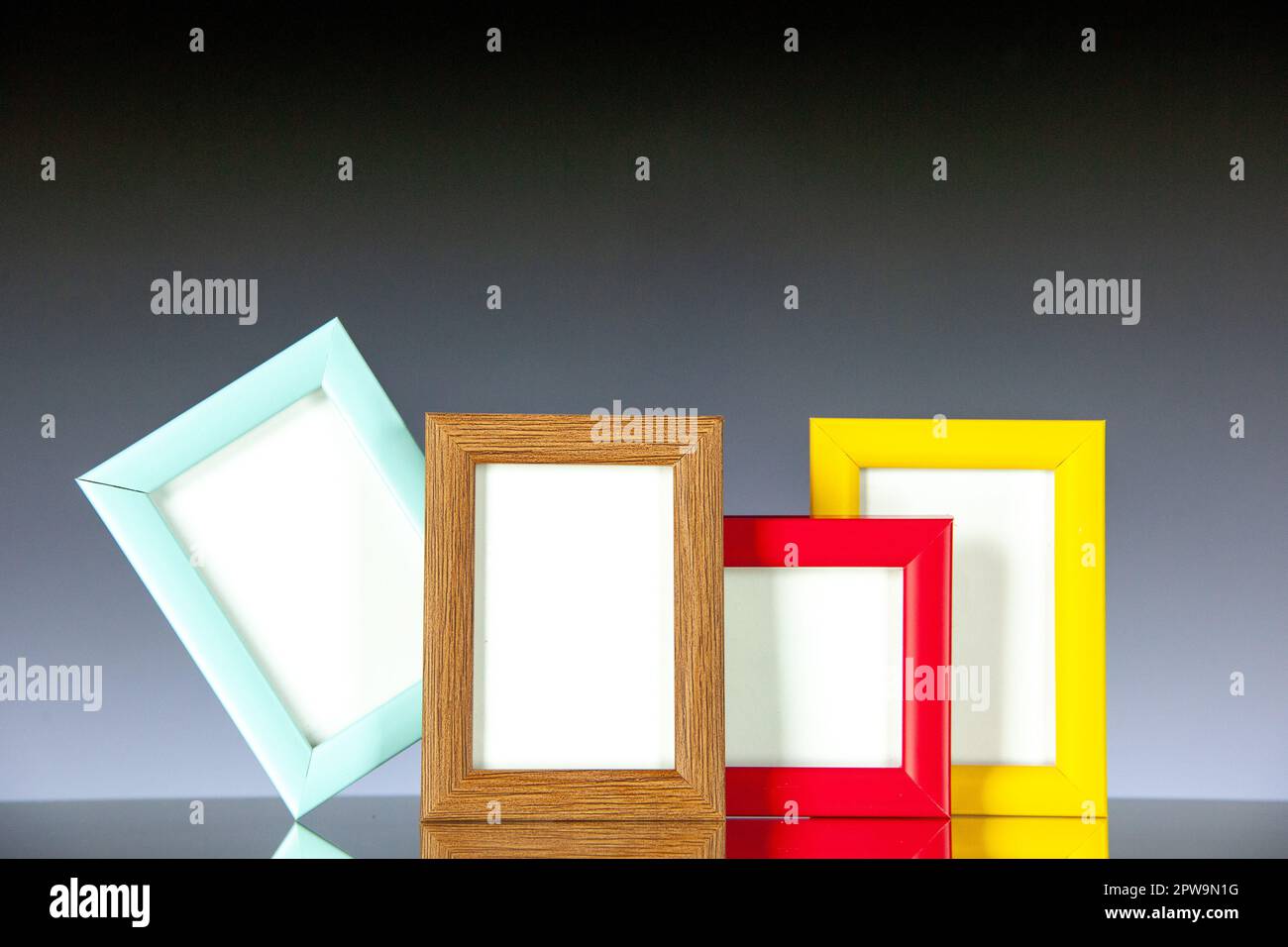 Different Photo Frame front view different picture frames with colored corners on light dark ...