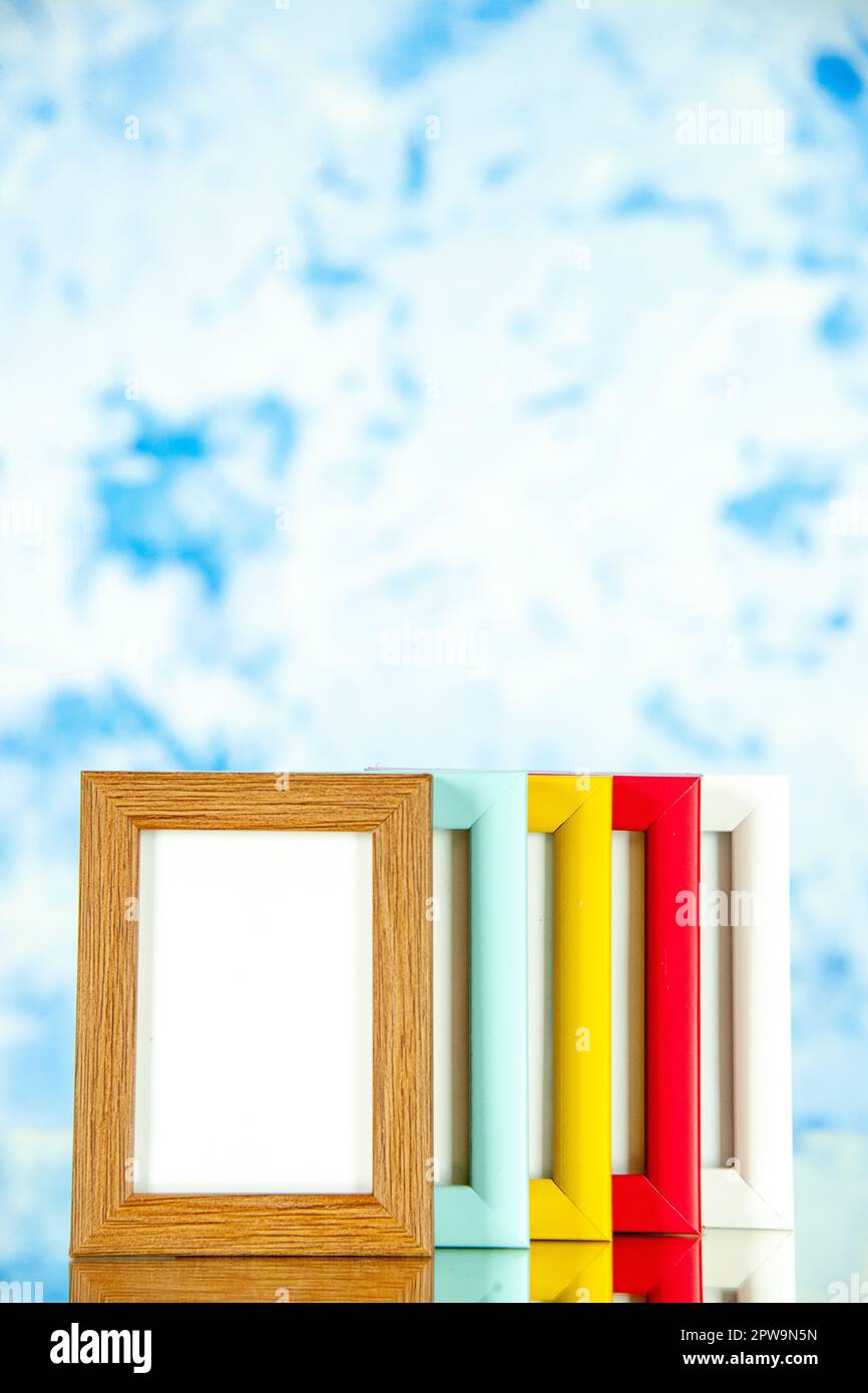Side Colur Frame front view different picture frames with colored corners on light-blue ...