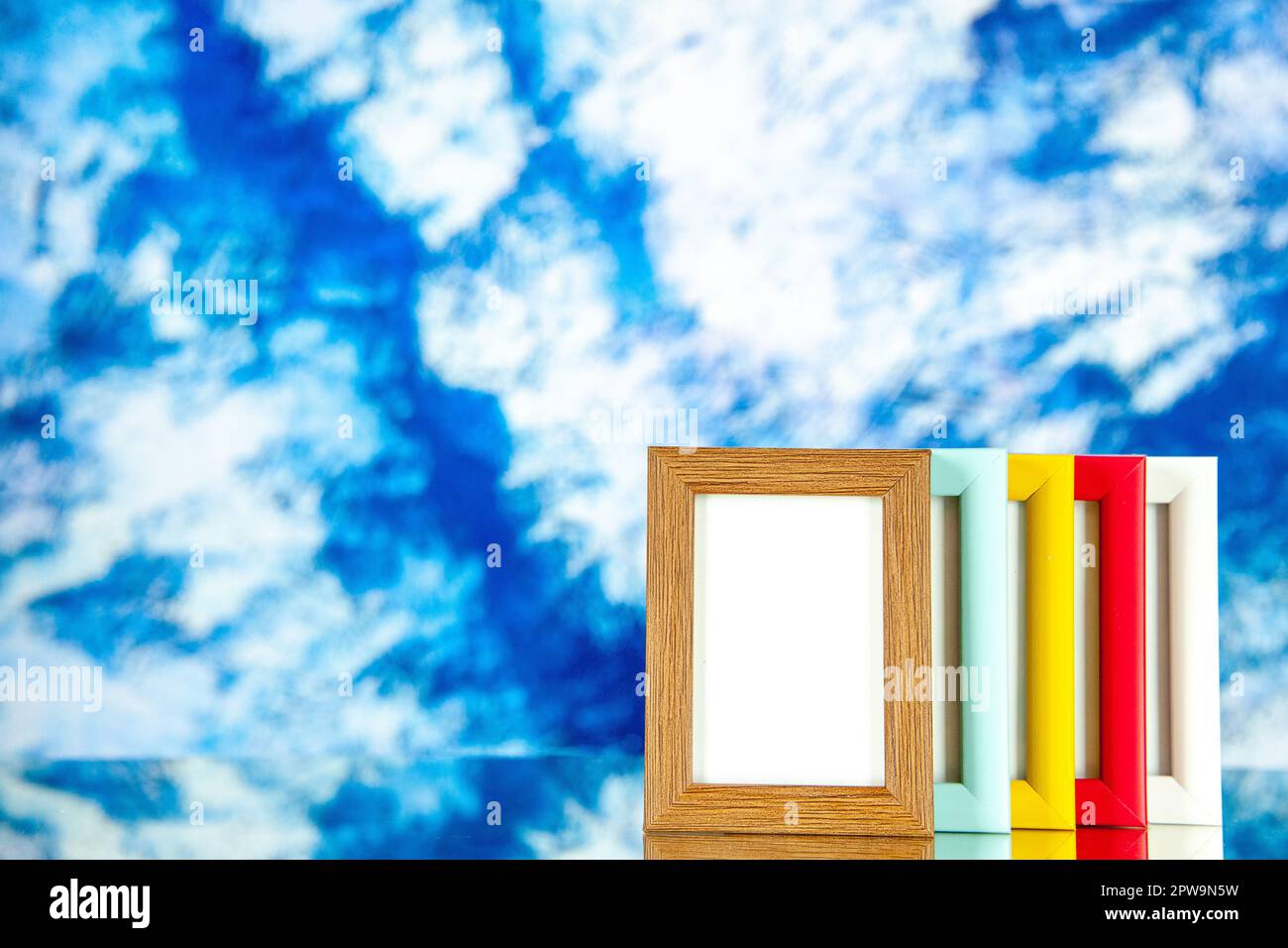 Side Colur Frame front view different picture frames with colored corners on light-blue ...