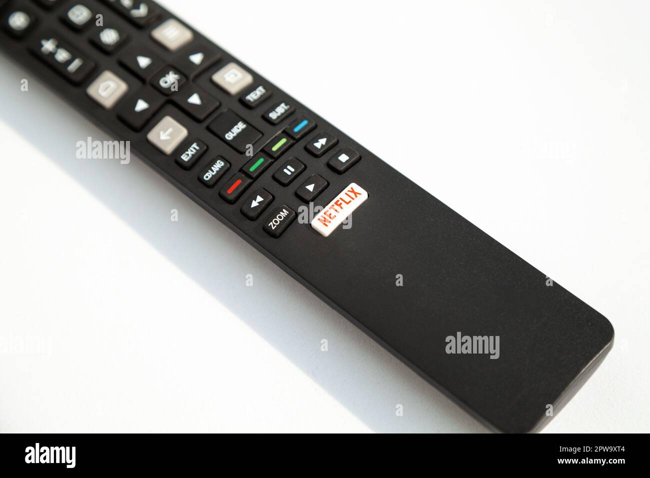 Ho Chi Minh City, Vietnam - March 28, 2023: Close-up of a button with the Netflix logo on a TV remote control. Digital streaming services company logo Stock Photo