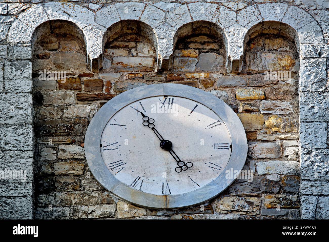 Clock on the town hall of Castellina in Chianti, Tuscany, Italy Stock Photo