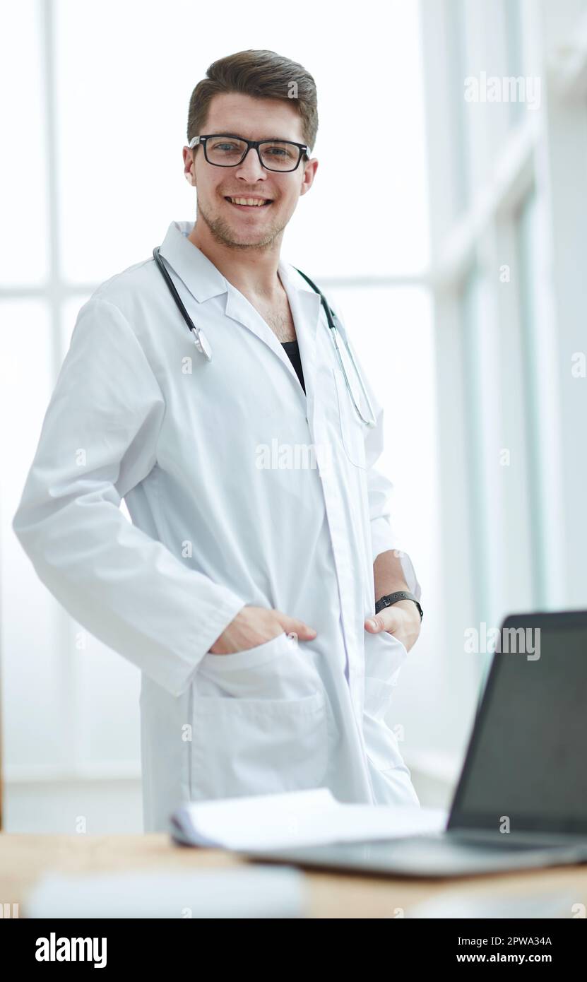 Handsome young medical doctor hi-res stock photography and images - Alamy