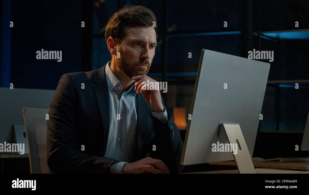Smart thoughtful adult man Caucasian businessman chief middle-aged entrepreneur leader thinking business plan create new idea searching solution Stock Photo