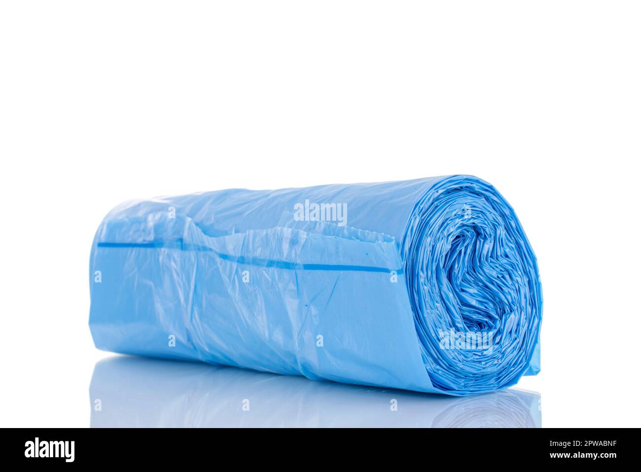 One pack of plastic garbage bags, macro, isolated on white background