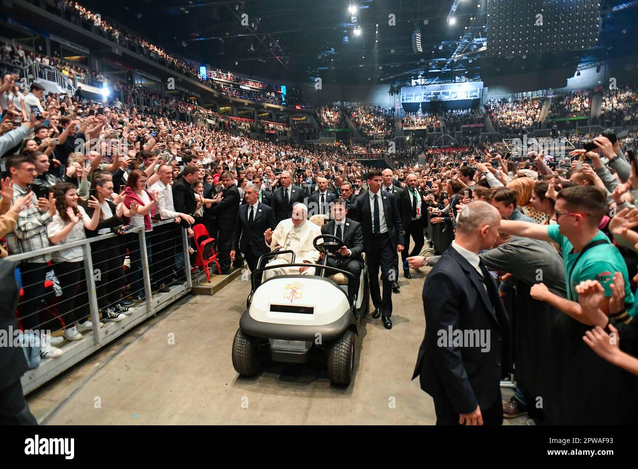 Hungary, Hu. 29th Apr, 2023. Hungary, 2023/4/29 .Pope Francis on stage as he meets with young people in the Papp Laszlo Budapest Sports Arena in Budapest, Hungary . Photograph by Vatican Media /Catholic Press Photo . RESTRICTED TO EDITORIAL USE - NO MARKETING - NO ADVERTISING CAMPAIGNS. Credit: Independent Photo Agency/Alamy Live News Stock Photo