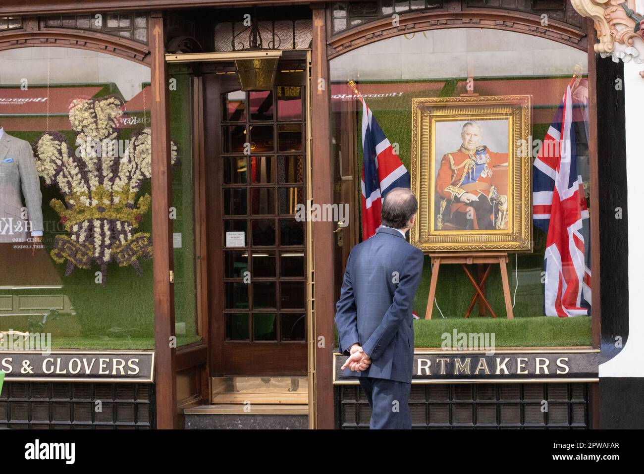 Shirtmaker boutique on Jermyn Street, displays a photograph of King Charles III ahead of the weekends Coronation, London, UK Stock Photo