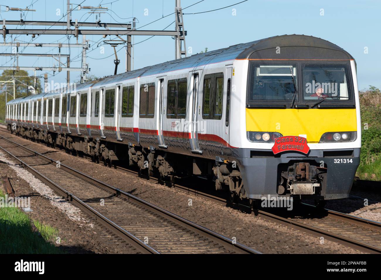 Ingatestone, Chelmsford, Essex, UK. 29th Apr, 2023. Rail company Greater Anglia are phasing out their old British Rail Class 321 electric multiple unit trains in favour of new Class 720 Aventra units. Built between 1988-91 the Class 321 units are among the oldest passenger trains in use on the UK’s rail network. Rail enthusiasts have been given a chance to travel on a special last train send-off tour which is visiting stations served for many years by the old trains from London Liverpool Street to Clacton and thence to Southend Victoria and return before final retirement. Stock Photo