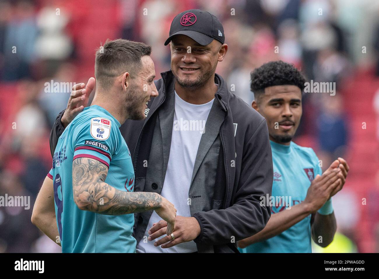 Burnley Manager Vincent Kompany congratulates Josh Brownhill #8 of Burnley  at full time during the Sky Bet Championship match Bristol City vs Burnley  at Ashton Gate, Bristol, United Kingdom, 29th April 2023 (, image size:1300x956