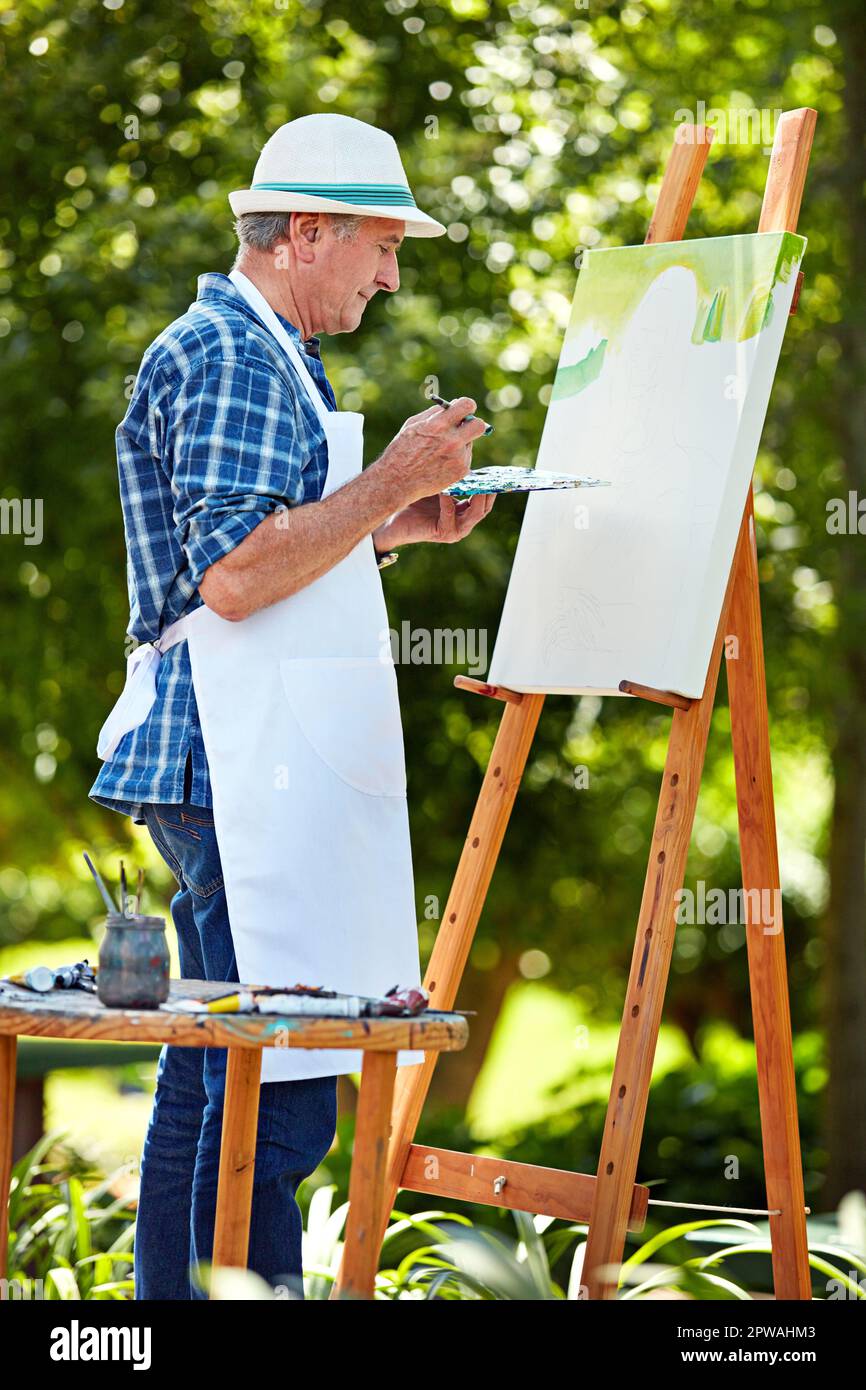 Man in garden painting hi-res stock photography and images - Alamy