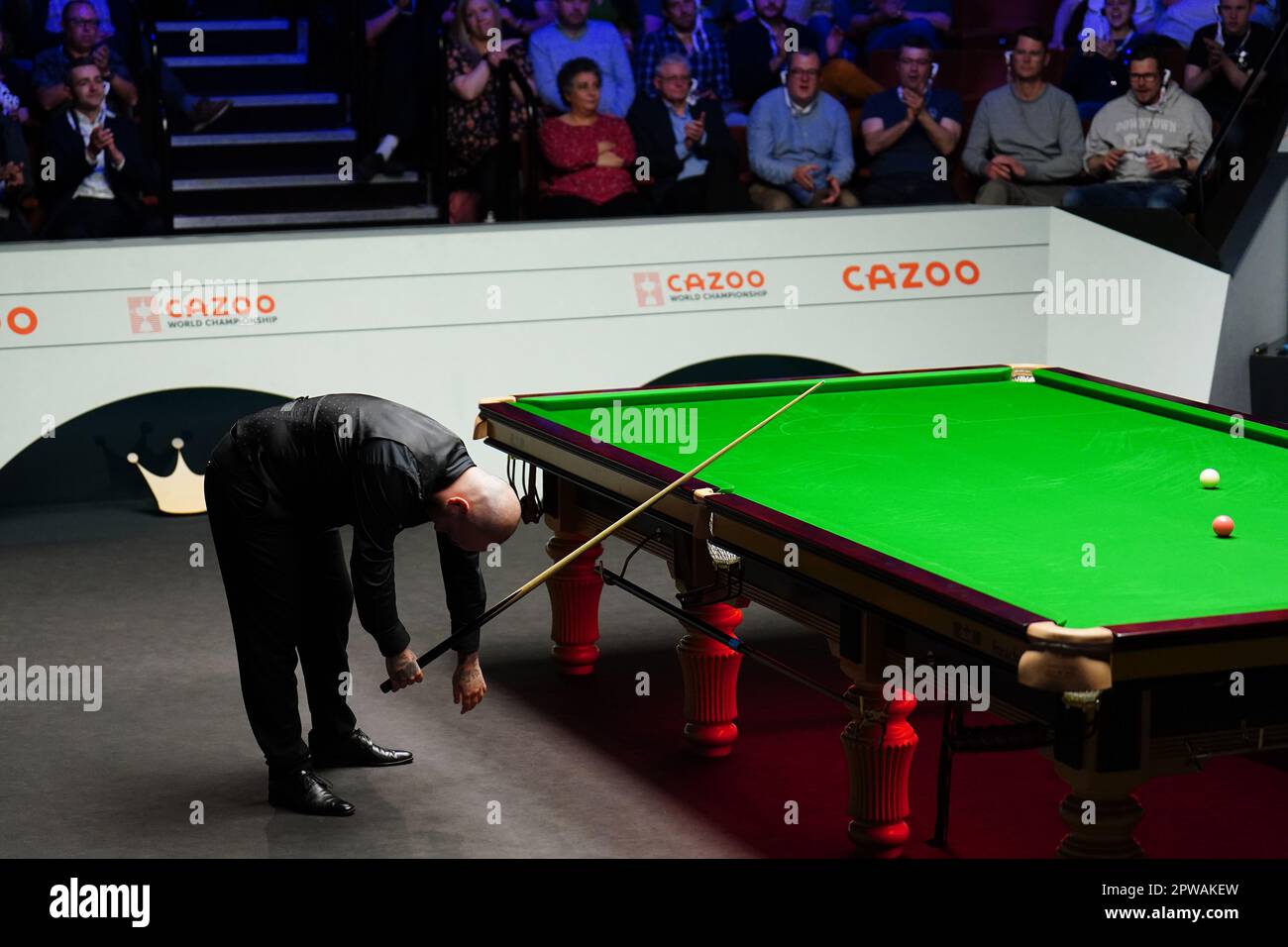 Luca Brecel reacts after winning his match against Si Jiahui (not