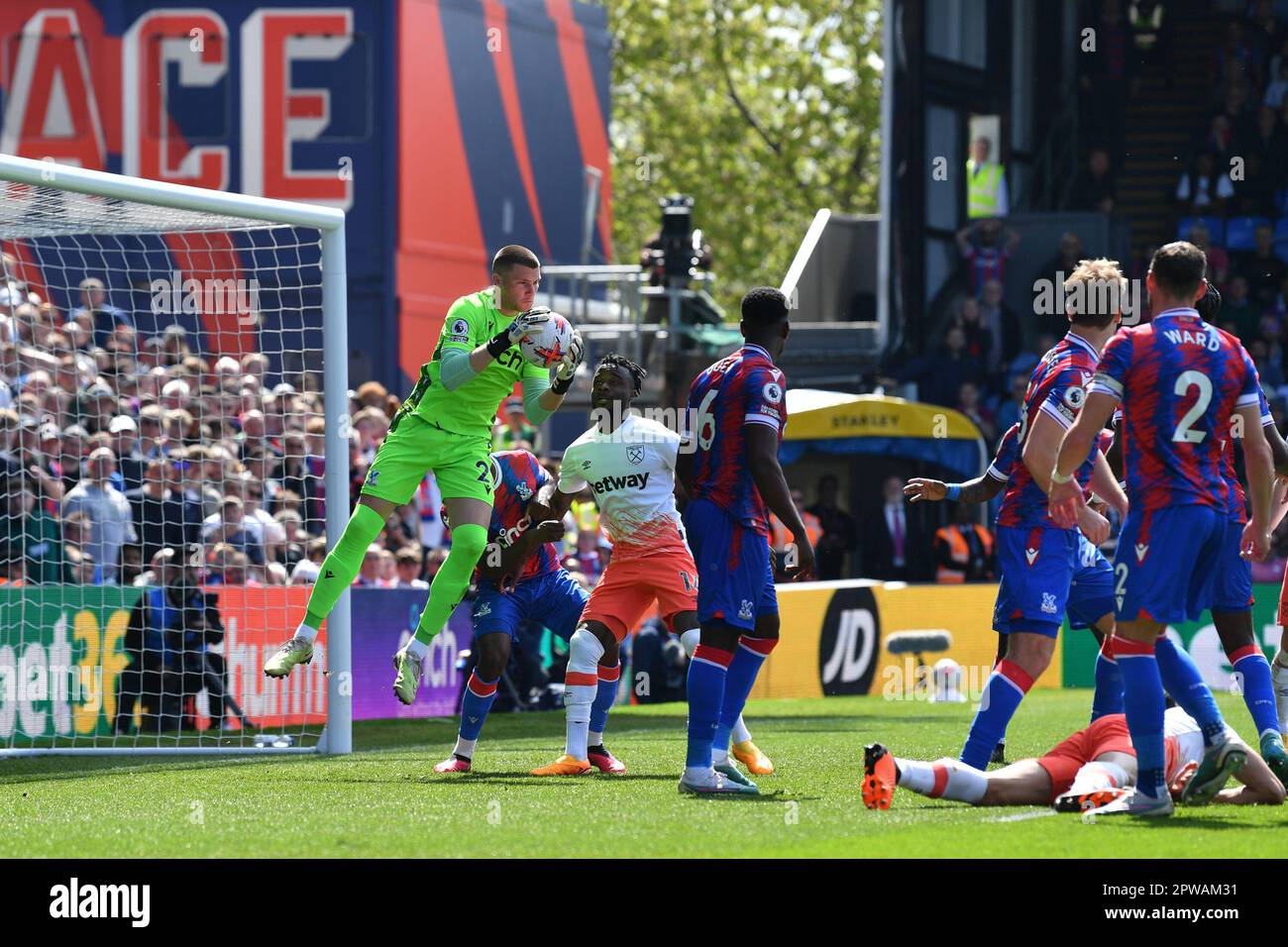 Joel Ward of Crystal Palace FC safely collects the ball during the
