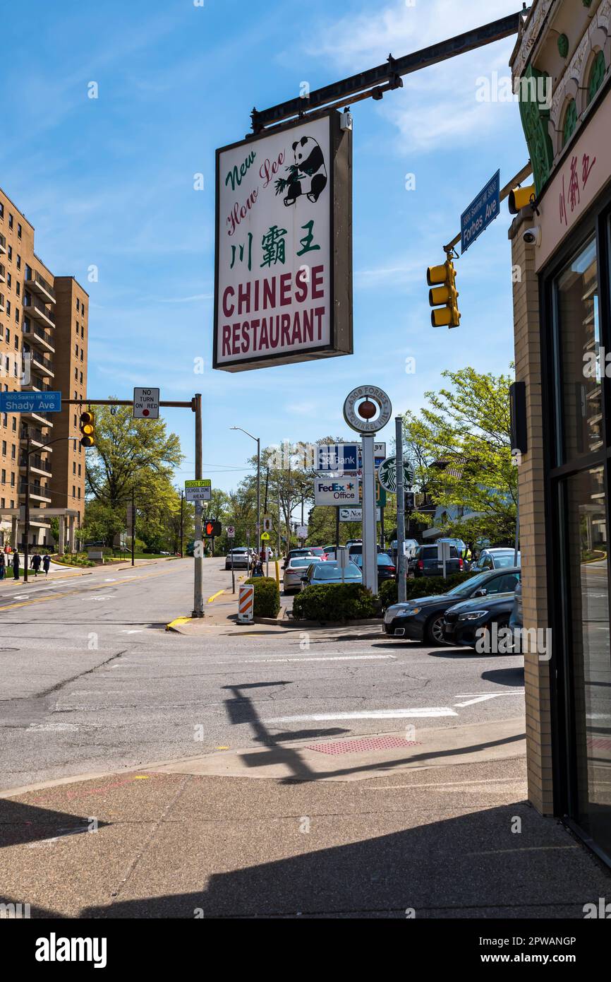 A sign for a Chinese restaurant at the intersection of Forbes and Shady