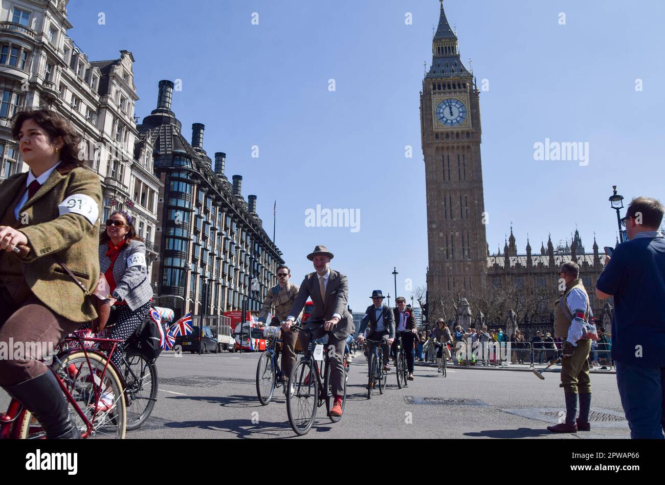 London, UK. 29th April 2023. Participants in The Tweed Run, a group of cyclists dressed in traditional British clothing, particularly tweed, pass through Parliament Square. Credit: Vuk Valcic/Alamy Live News Stock Photo