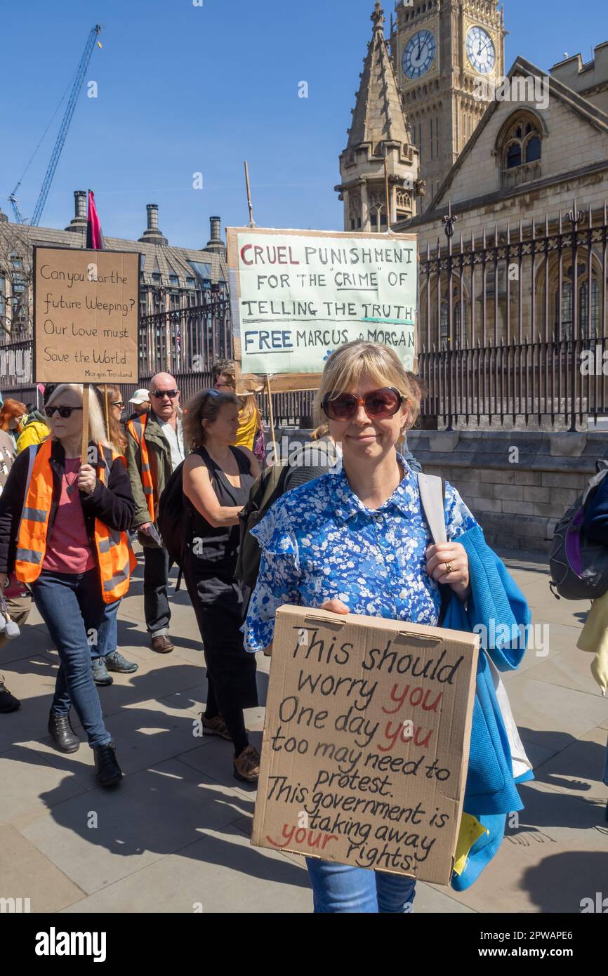 London, UK. Just Stop Oil march to a short rally next to 
