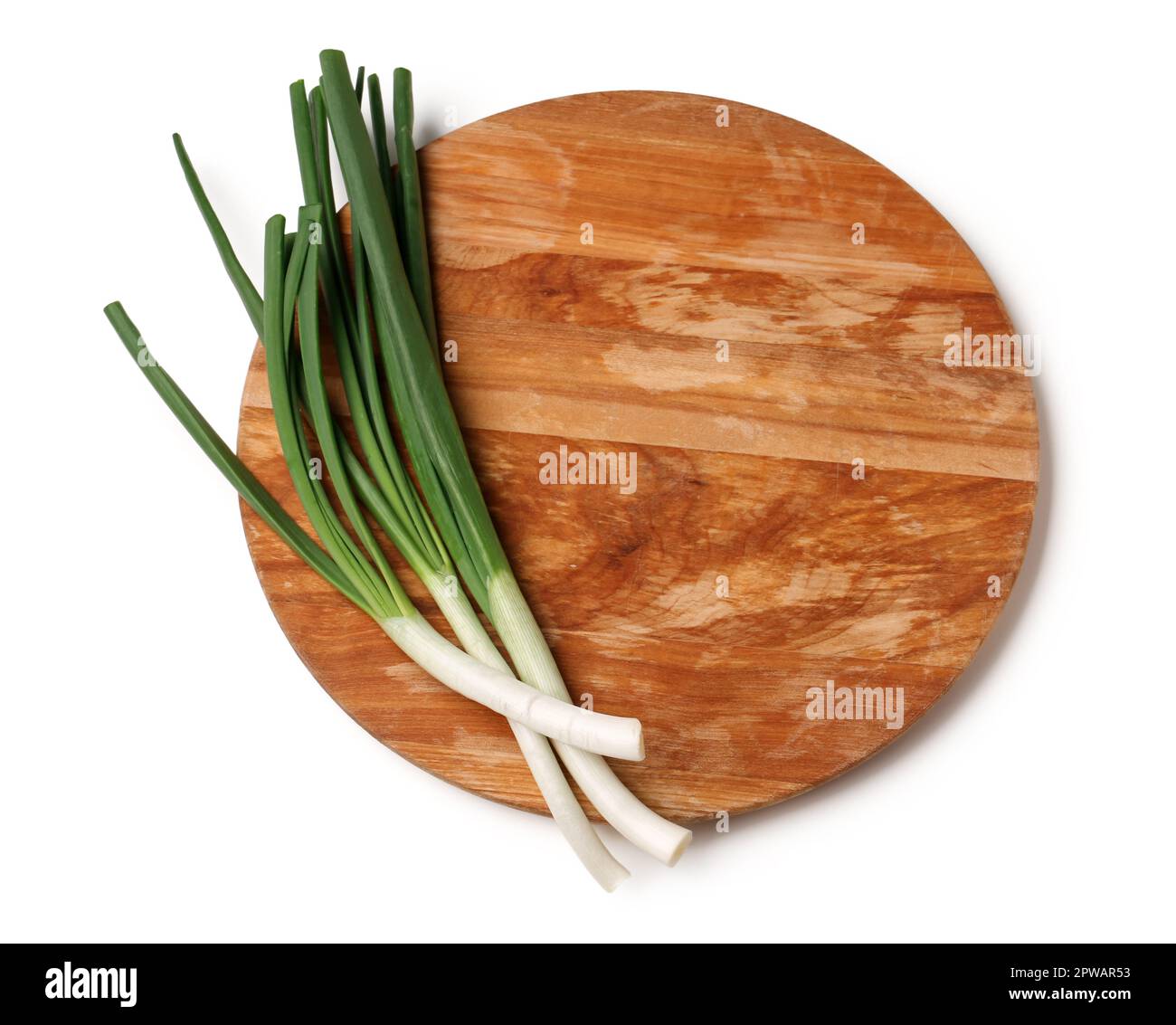 Wooden board with fresh green onion on white background Stock Photo - Alamy