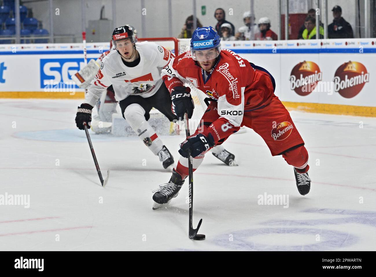 Brno, Czech Republic. 29th Apr, 2023. L-R Paul Hube (AUT) and Ondrej  Beranek (CZE) in action during the World Championship and Euro Hockey  Challenge match Czech Republic vs Austria, Brno, Czech Republic,