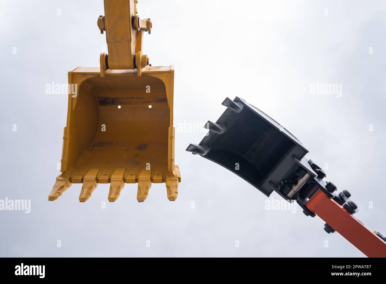 Close up of excavator bucket on a background of sky. High quality photo Stock Photo