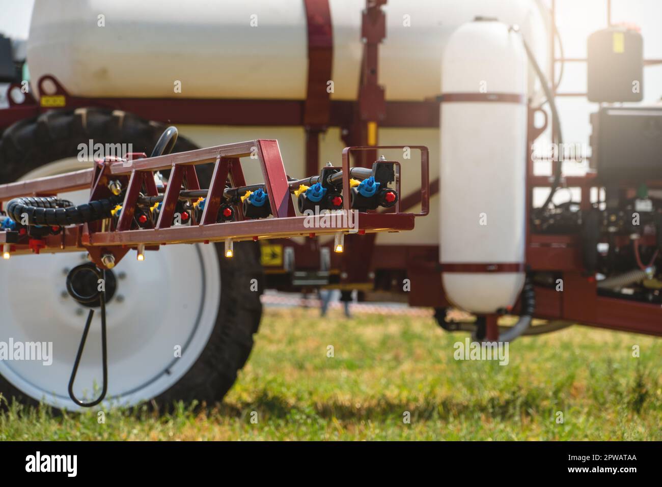 Machine for spraying pesticides and herbicides on the field. High quality photo Stock Photo