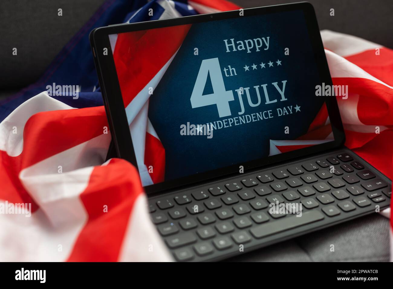 Digital tablet and USA flag Stock Photo - Alamy