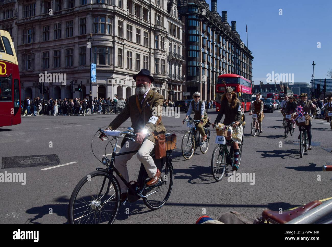 London, England, UK. 29th Apr, 2023. Participants in The Tweed Run, a group of cyclists dressed in traditional British clothing, particularly tweed, pass through Parliament Square. (Credit Image: © Vuk Valcic/ZUMA Press Wire) EDITORIAL USAGE ONLY! Not for Commercial USAGE! Credit: ZUMA Press, Inc./Alamy Live News Stock Photo