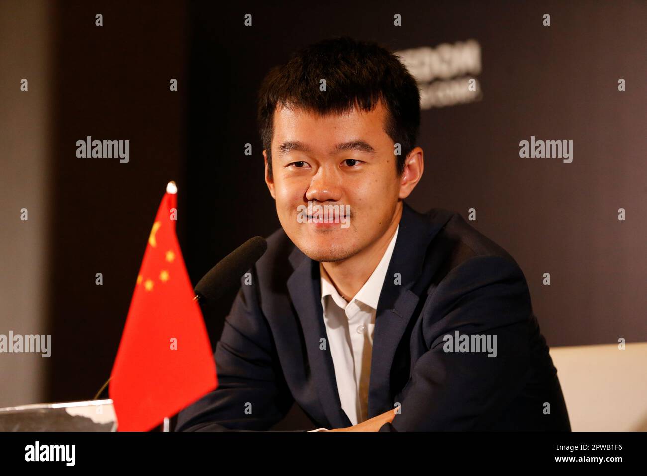 China's Ding Liren, left, and Russia's Ian Nepomniachtchi shake hands prior  to their FIDE World Chess Championship in Astana, Kazakhstan, Saturday,  April 29, 2023. Ian Nepomniachtchi and Ding Liren are facing off